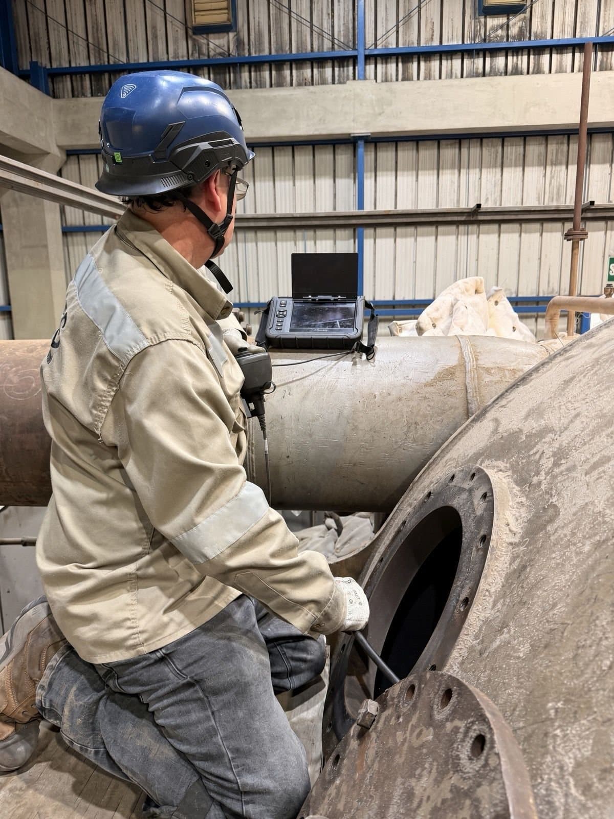 KVSG technician preparing access to the equipment at the plant